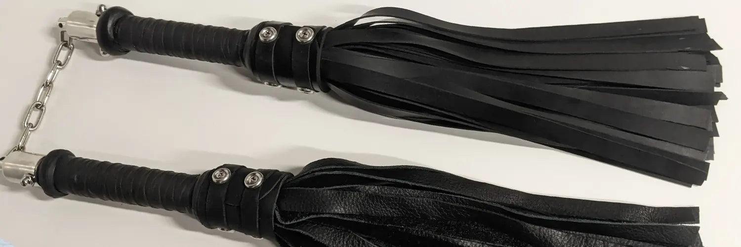 Black nunchuck sliders with a silver chain