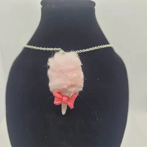 A pink cotton candy necklace